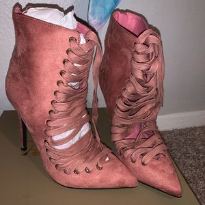 Pink lace up faux suede booties